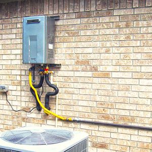 tankless water heater on the outside of a home