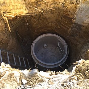 manhole being constructed below the ground level